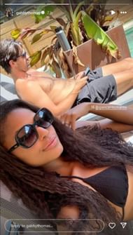Thomas shares frame with her fiance as both enjoy soaking up the sun; Instagram - @gabbythomas